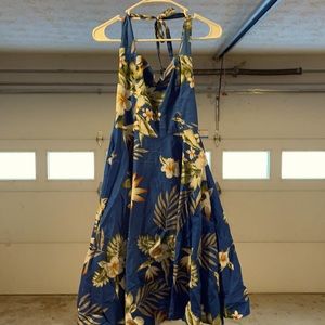 Blue twirly sundress. Floral, sweetheart neckline.